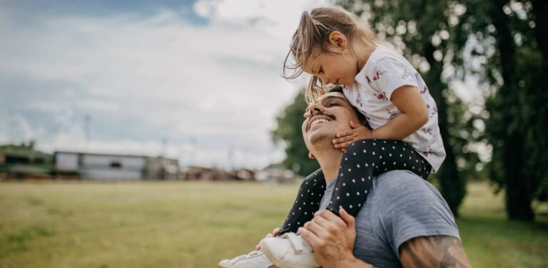 dad-with-daughter-on-shoulders.ashx_.jpeg