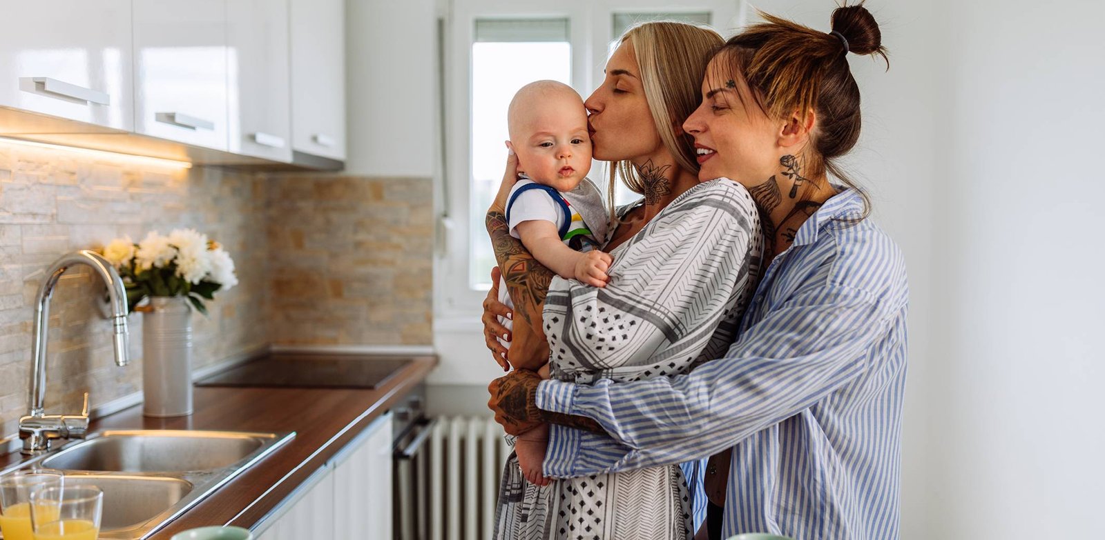 young-lgbt-couple-with-baby.ashx_.jpeg